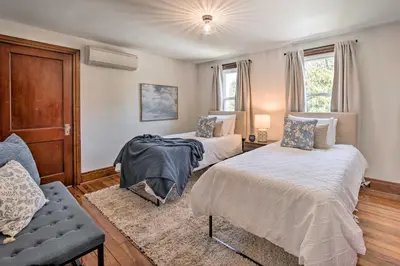 a bedroom with two beds and a couch in it at Home 2 Mi to Hersheypark Work and Play! in Hershey