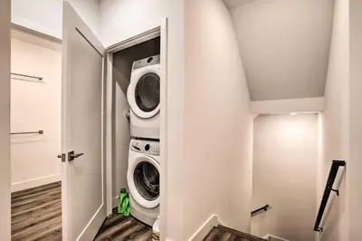 a laundry room with a washer and dryer at Trendy Apt with Laundry Machines Less Than 3 Mi to Dtwn in Philadelphia