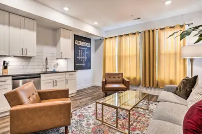 a living room with a couch and chairs and a table at Trendy Apt with Laundry Machines Less Than 3 Mi to Dtwn in Philadelphia