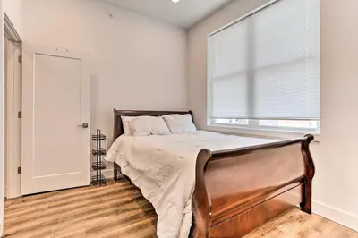 a bedroom with a bed and a window at Central Pet-Friendly Apt - Minutes to Dtwn! in Philadelphia