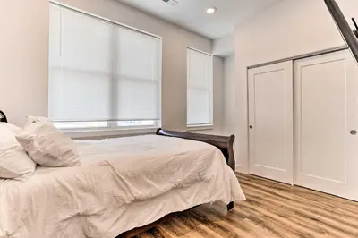 a bedroom with a bed and a window at Central Pet-Friendly Apt - Minutes to Dtwn! in Philadelphia