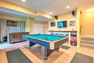a billiard room with a pool table in it at Community Perks and Deck Lake Harmony Townhome! in Lake Harmony
