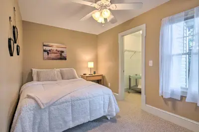 a bedroom with a bed and a ceiling fan at Large Yard and Games Edgewater Escape in Paupack! in Paupack