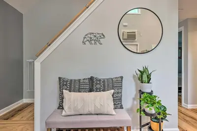 a stairway with a bench and a mirror at Near Lakes and Resorts Pet-Friendly Long Pond Abode in Long Pond