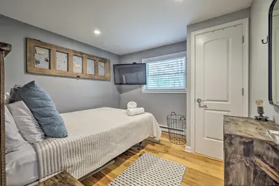a small bedroom with a bed and a window at Near Lakes and Resorts Pet-Friendly Long Pond Abode in Long Pond