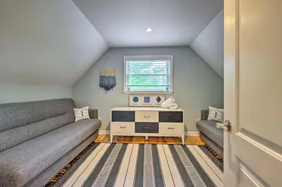 a living room with two couches and a window at Near Lakes and Resorts Pet-Friendly Long Pond Abode in Long Pond
