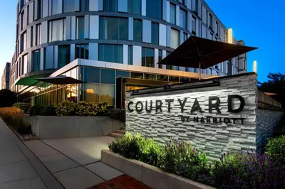 a building with a sign in front of it at Courtyard by Marriott Philadelphia South at The Navy Yard in Philadelphia