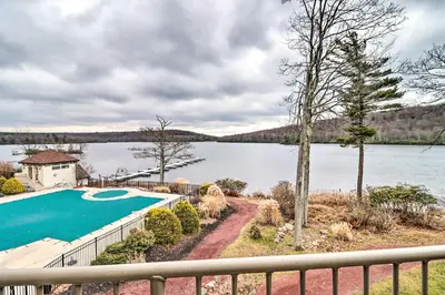 a view of a swimming pool from a balcony at Half-Mi to Big Boulder Lake Townhome with Deck! in Lake Harmony