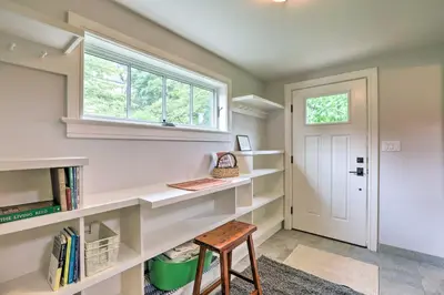 a home office with a desk and a window at Barn-Like Studio Suite with Flowering Garden! in Titusville