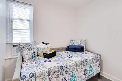 a room with a couch and a window at about 4 Mi to Downtown Philadelphia Cozy Retreat in Philadelphia
