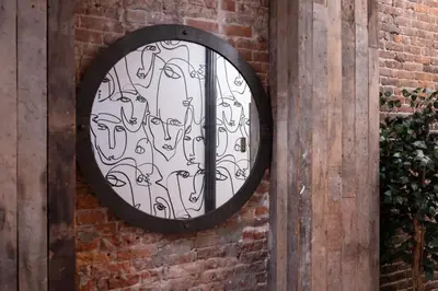 a wrought iron window on a brick wall at The Flat NYC in New York