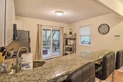 a kitchen with a granite counter top in a room at 7 Mi to Lake Harmony Home with Furnished Deck! in Albrightsville
