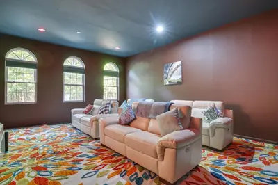 a living room with a couch and two couches at Game Room and Home Theater! Immaculate Poconos Lodge in Albrightsville