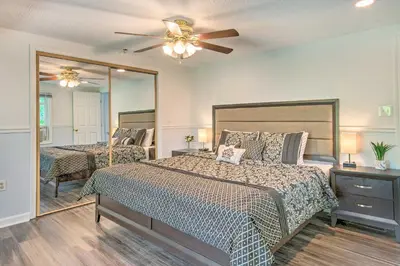 a bedroom with two beds and a ceiling fan at River Views and Covered Deck Susquehanna Home! in Susquehanna