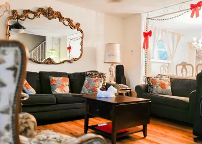 a living room with a couch and a table at ABnB Superhost - Siri's Favorite Place in Havertown