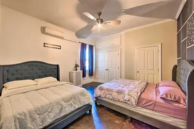 a bedroom with a bed and a ceiling fan at 1 Mi to Dtwn Historic Harrisburg Home in Harrisburg