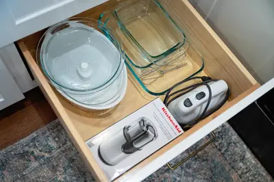 a drawer with a bowl and a sink and a bowl at The Loft at Woodhaven Hideaway in Myerstown