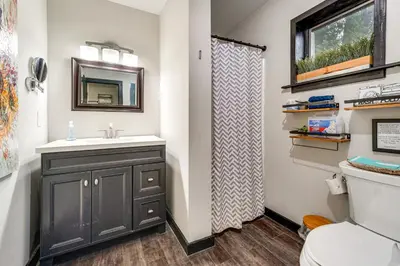 a bathroom with a sink and a toilet at Mtn-View Gem with Deck and Hot Tub in Tannersville in Tannersville