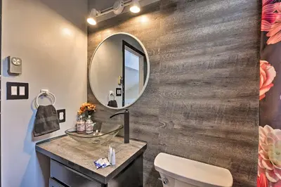 a bathroom with a sink and a mirror at 7 Mi to Tobyhanna State Park Quiet Retreat! in Tobyhanna