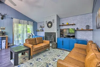 a living room with two couches and a tv at Wraparound Deck Big Bass Lake Home in Gouldsboro in Gouldsboro