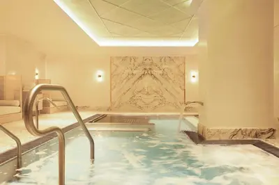 a hot tub in a hotel room with aitating at Fouquet's New York in New York