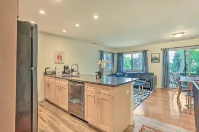 a kitchen with a large island in the middle at Sun-Lit Vernon Condo Less Than 2 Mi to Ski Resort! in Vernon Township