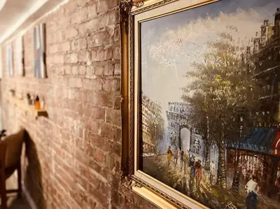 a painting of a painting of a city on a wall at 1850s historic Row House 7min train to NYC with private backyard in Jersey City