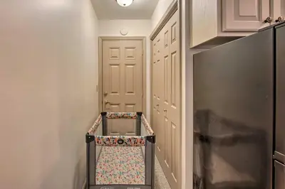 a hallway with a walk in closet and a door at Cozy Garden Room in Welsh Mountain Suites! in New Holland
