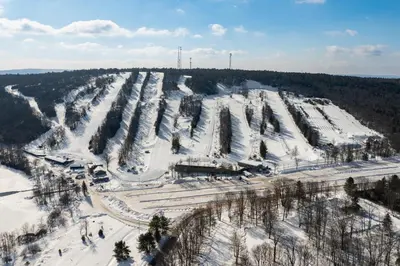 an aerial view of a ski resort covered in snow at Unwind in Telstar in Lake Harmony