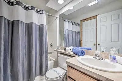 a bathroom with a sink and a toilet at Tannersville Townhome, Near Camelback Mtn! in Tannersville