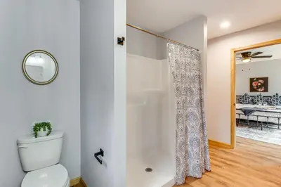 a bathroom with a shower and a toilet in a room at Hot Tub Soaks! Family Home 6 Mi to Big Boulder Mtn in Albrightsville