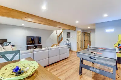 a living room with a couch and a table at Hot Tub Soaks! Family Home 6 Mi to Big Boulder Mtn in Albrightsville