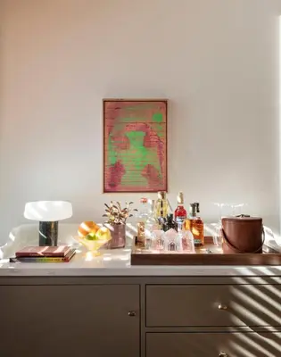 a kitchen counter with a table with food on it at The Quoin Hotel in Wilmington