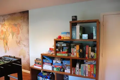 a book shelf filled with books in a room at VAAST Bed & Breakfast in Adamstown