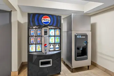 a krispy kreme ice cream machine in a room at Red Carpet Inn and Suites in Bellmawr