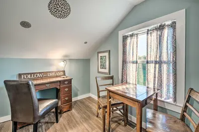 a home office with a desk and a table at Deck and Game Room Home in Pennsylvania Countryside in Klingerstown