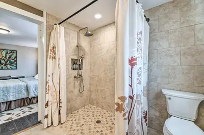 a bathroom with a shower and a toilet at Deck and Game Room Home in Pennsylvania Countryside in Klingerstown