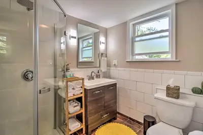 a bathroom with a shower and a toilet and a sink at Game Room, Community Beach Pocono Home! in Albrightsville