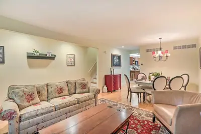 a living room with a couch and a table at Charming Lambertville Retreat - 1 Mi to River! in Lambertville