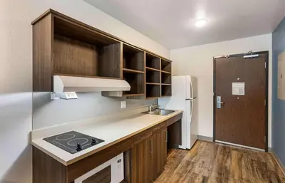 a small kitchen with a sink and a refrigerator at Extended Stay America Suites - Philadelphia - Plymouth Meeting - West in Plymouth Meeting
