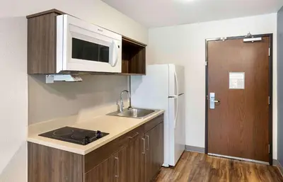 a small kitchen with a sink and a microwave at Extended Stay America Suites - Philadelphia - Plymouth Meeting - West in Plymouth Meeting