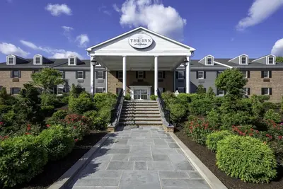 a building with a sign on the front of it at The Inn at Lewisburg, BW Signature Collection in Lewisburg
