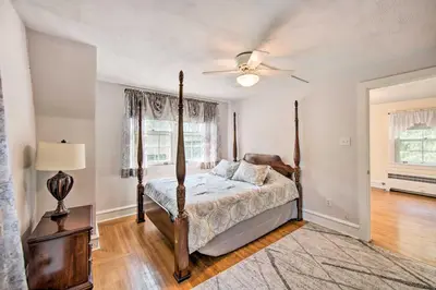 a bedroom with a bed and a ceiling fan at 3-Acre Property Charming Dutch Country Colonial in Reading