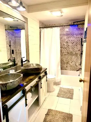 a bathroom with two sinks and a shower at Big Boulder Lake and Ski!!!! in Lake Harmony