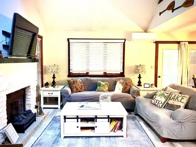 a living room with a couch and a fireplace at Big Boulder Lake and Ski!!!! in Lake Harmony