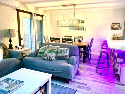 a living room with a couch and a table at Big Boulder Lake and Ski!!!! in Lake Harmony
