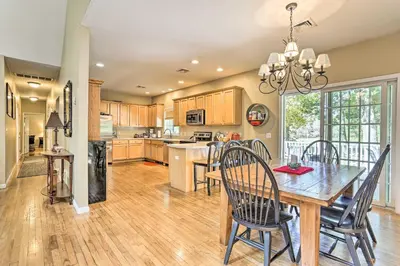 a kitchen and dining room with a table and chairs at Pet-Friendly Grand Pine Bush Retreat on 2 Acres! in Pine Bush