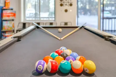 a group of balls on a pool table at Less Than 7 Mi to Slopes Inviting Pocono Mtn Retreat! in Albrightsville