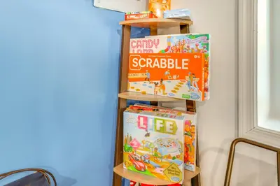 a stack of boxes of cereal on a shelf at Less Than 7 Mi to Slopes Inviting Pocono Mtn Retreat! in Albrightsville