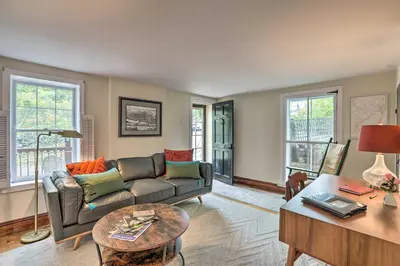 a living room with a couch and a table at Historic Home in Lambertville Walk to Bridge in Lambertville